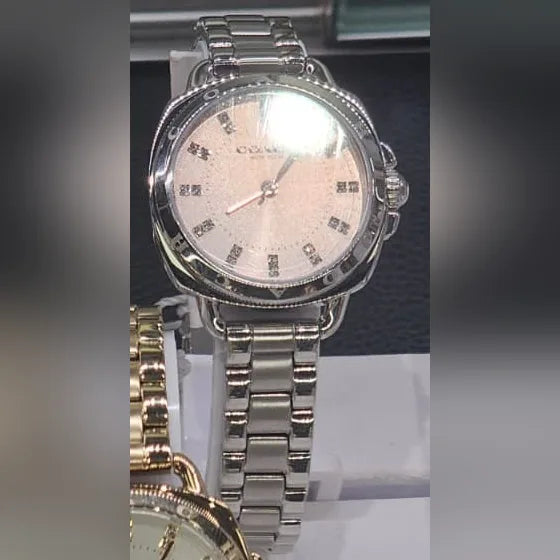 Coach Silver cushion, blush dial
