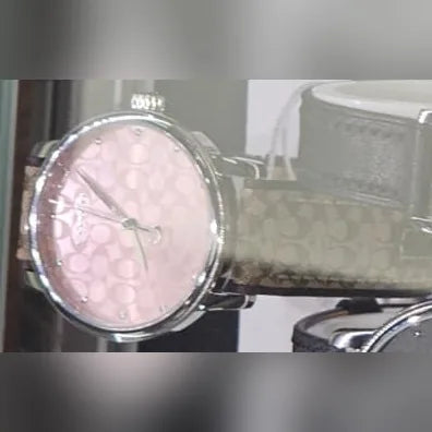 Coach Pink logo dial, signature strap