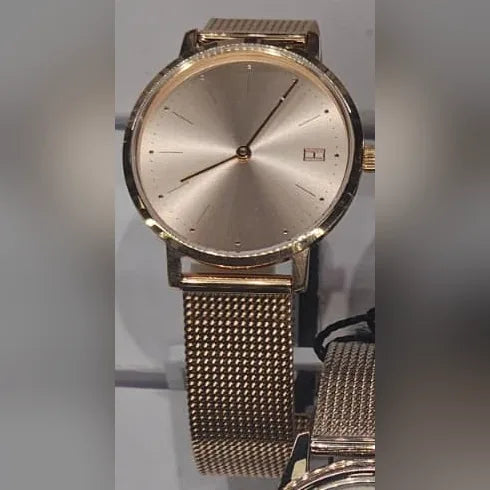 Tommy Hilfiger Rose-gold mesh, minimal dial