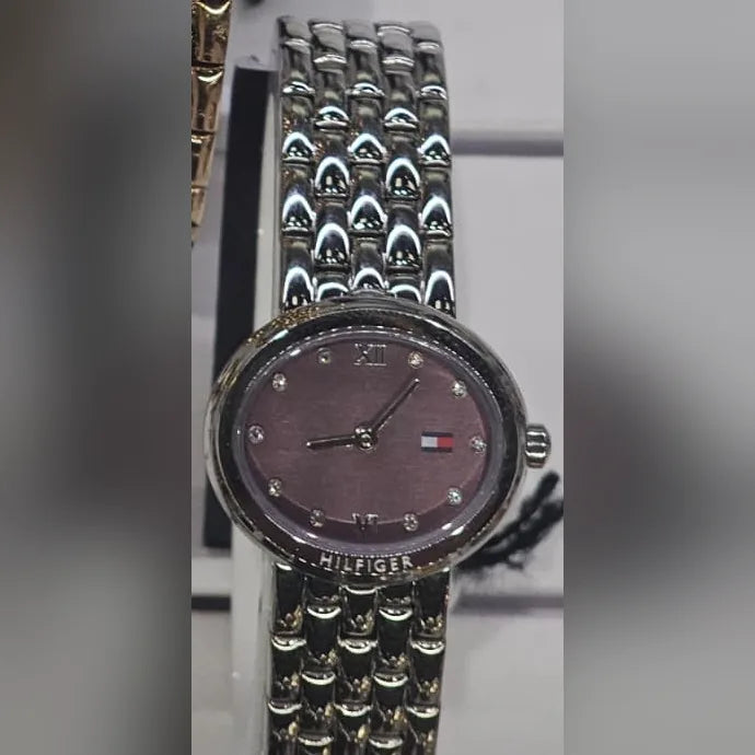 Tommy Hilfiger Silver oval, mauve dial