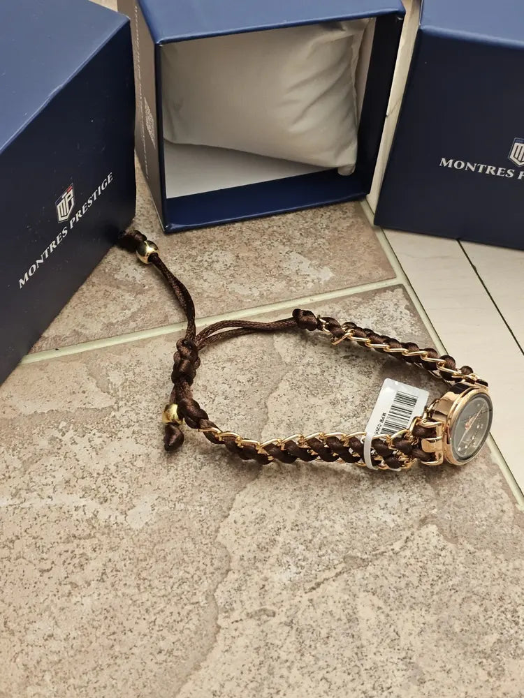 Montres Prestige Women’s black braided band, 25mm