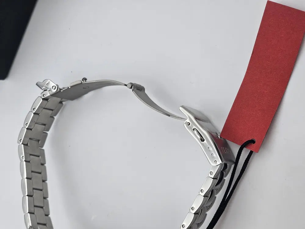 Tetra Chronograph, steel, white dial, red logo