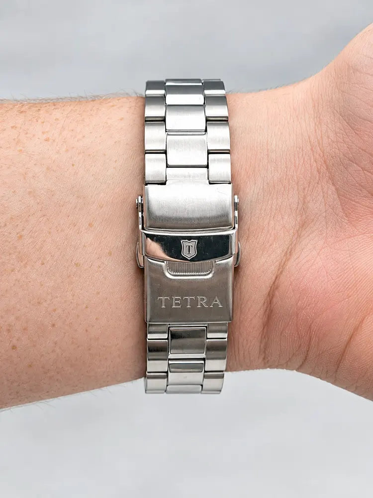 Tetra 773A chronograph, steel link band, white dial